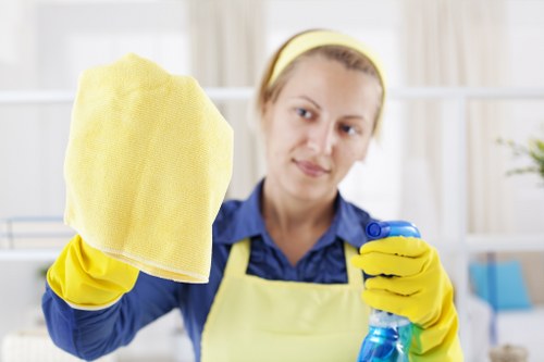 Office cleaners working in a Wimbledon business workspace