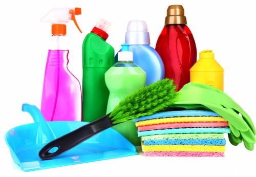 Furniture and household items being sorted during a house clearance in SW19